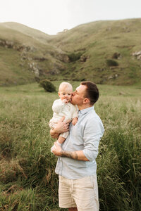Father and baby during a family photoshoot in Christchurch