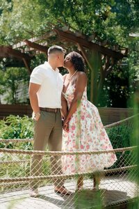 Couple kissing during their engagement photoshoot in atlanta georgia