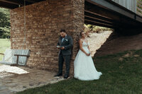 Couple holding hands during private first touch before Mason Farms wedding ceremony by Crimson Conure Photography based in denver Colorado and Kennesaw Georgia