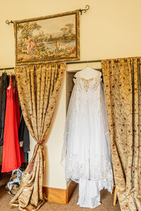 Venice Beach Los Angeles wedding photography close up detail of the bride’s wedding dress with lace texture, delicate fabric, and true to life color in soft natural light.