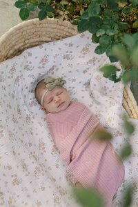 Newborn baby girl swaddled in pink during a Palo Alto newborn photography session