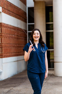 Nursing student graduating photo with syringe