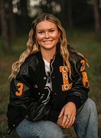 Senior Portrait at Loblolly Farm in Semmes, Alabama -- wearing letterman jacket