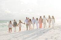 Extended family group portrait at beach by Niceville family photographer