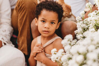 Charleston Baby Milestone Photographer - Toddler gazes at the camera during Milestone Portraits in Charleston, SC