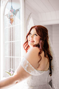 Close up bridal portrait of the bride after her ceremony at The Barn At Paradise Place captured by Graceful Ray Photography in Fort Worth Texas