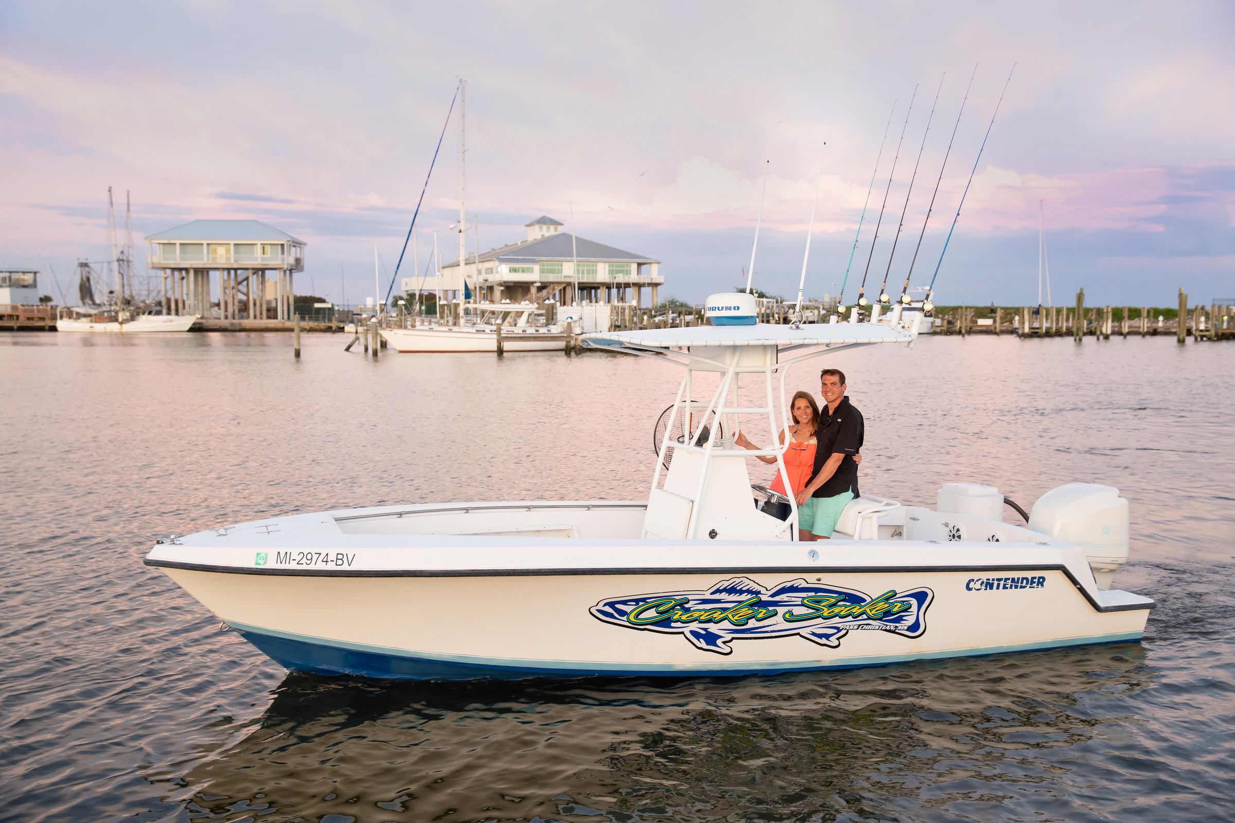 Unique engagement session in Gulfport MS with the water