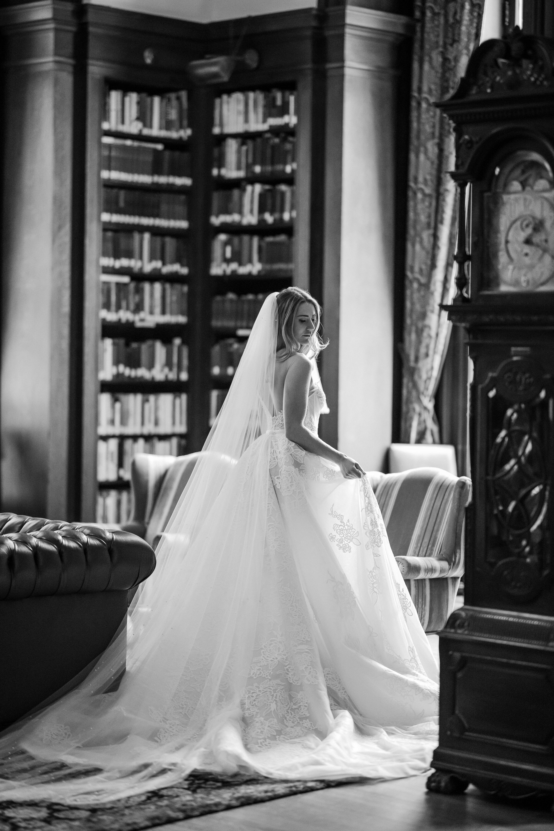 An editorial style bridal portrait of the bride wearing an Eisen Stien bridal gown at Union League in Philadelphia