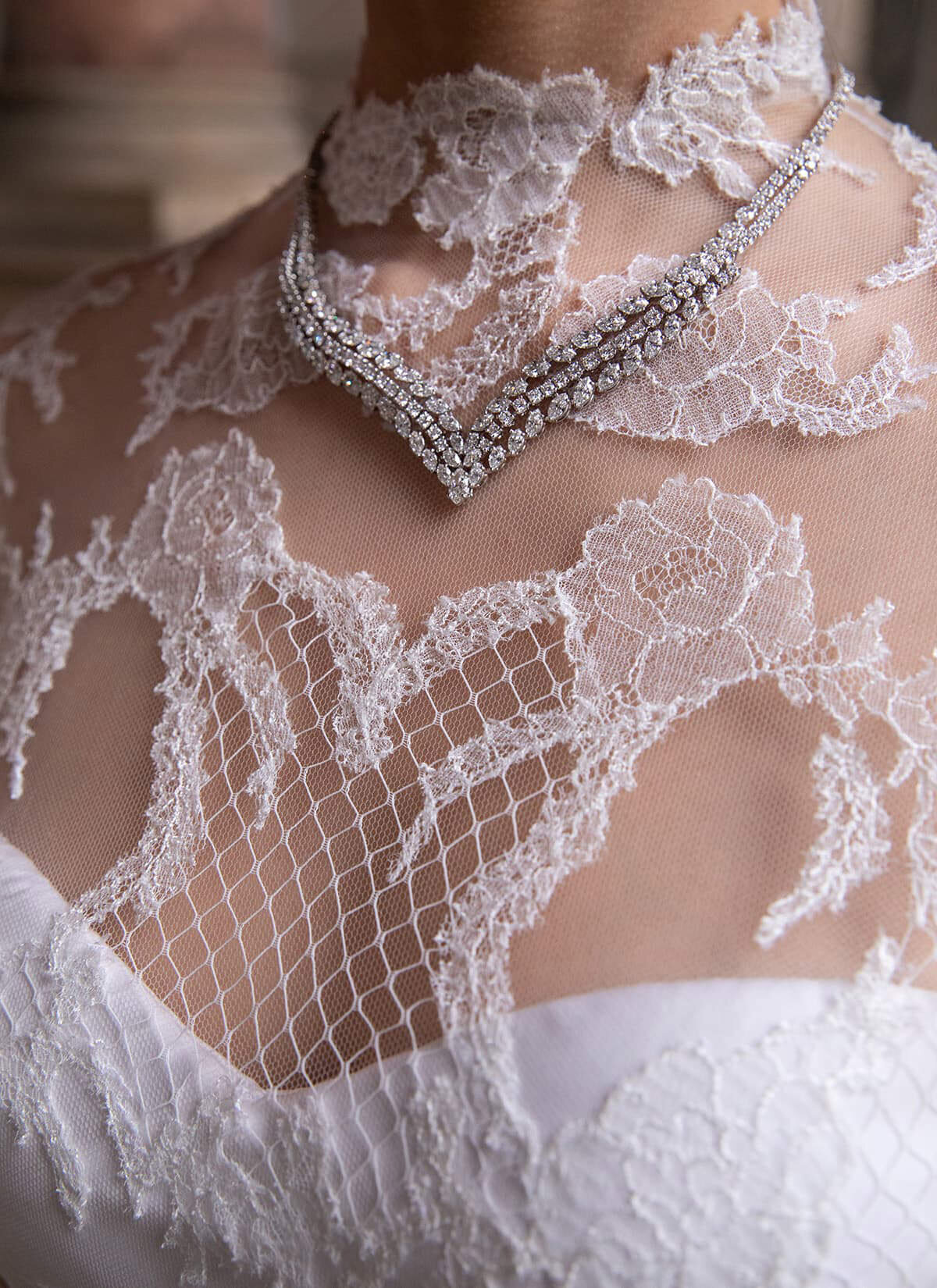 Closeup of lace on wedding gown
