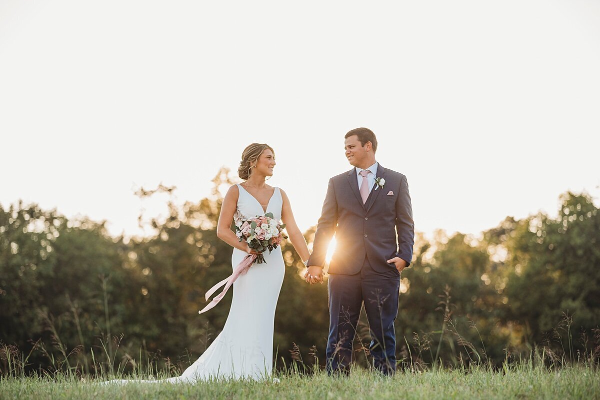 Couple portraits during golden hour on their wedding
