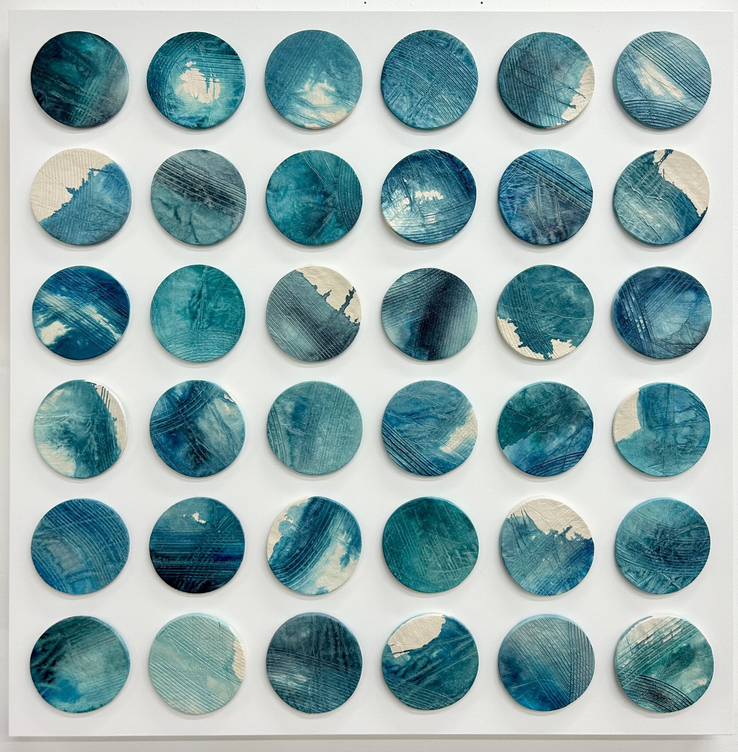 Emily Mann, Ink and Indigo, customizable dimensional wall artwork, paperclay disks with watercolor, 36x36-1