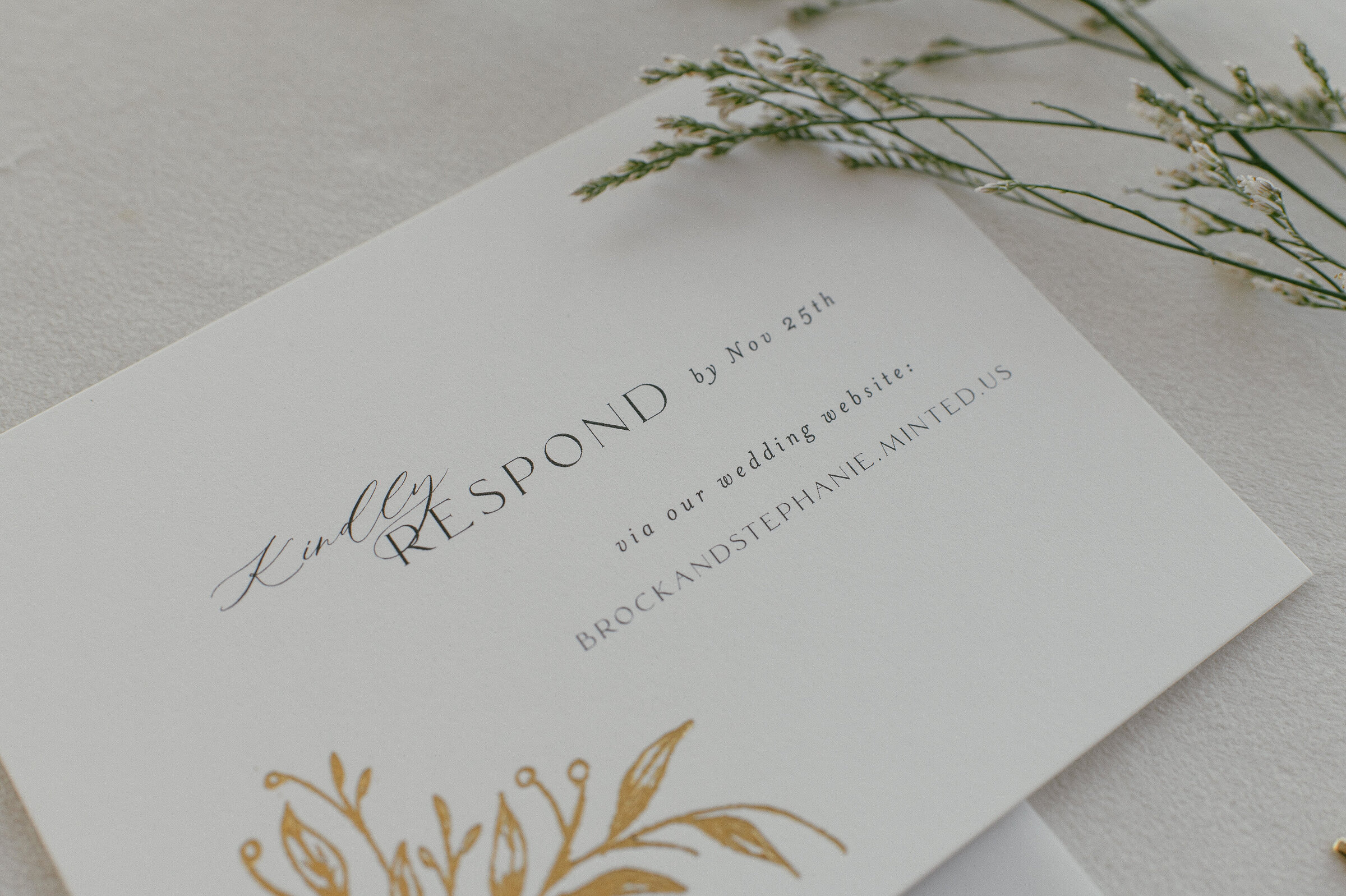 RSVP card with gold leaf design for wedding
