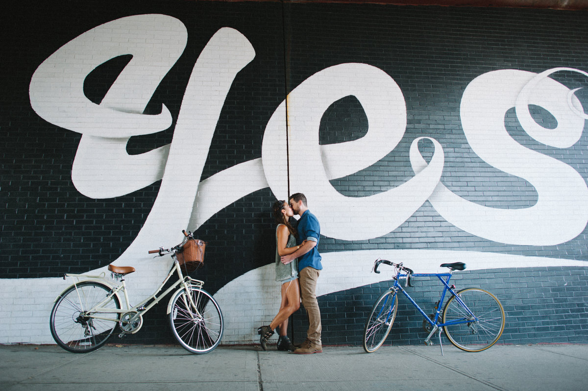 86-Dumbo-Brooklyn-NYC-engagement-photos-yes-wall