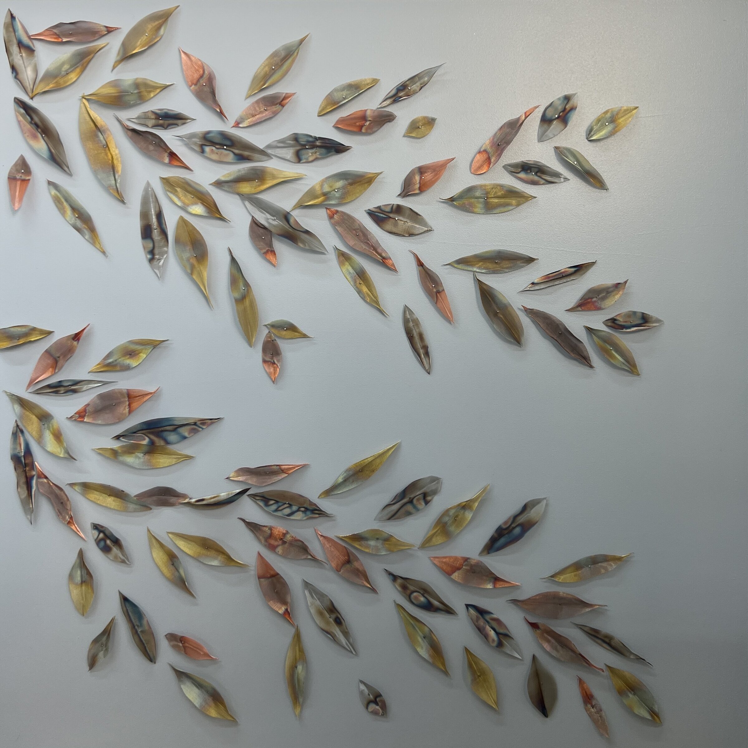 Emily Mann, Ink and Indigo, Cut Brass, Stainless Steel, and Copper Metal Leaves on painted backers, 30x30 in eachIMG_6638 (1)