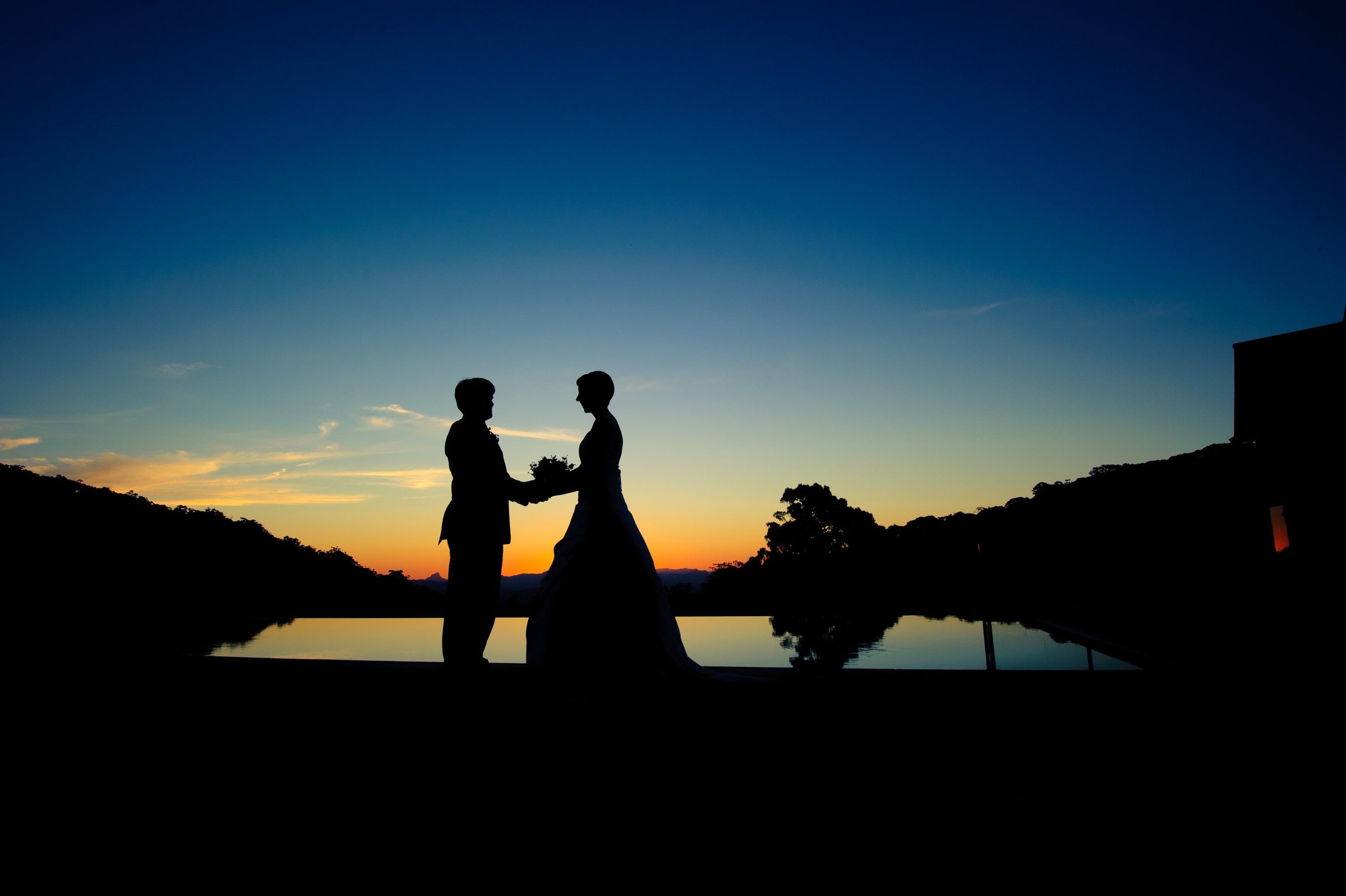 Poolside sunset oriellys wedding photogrpahy