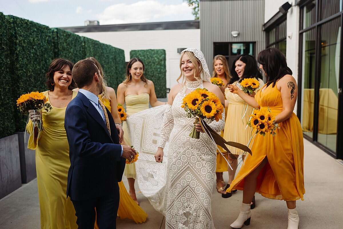 Boho bride with sunflower bouquet at Ruby Nashville