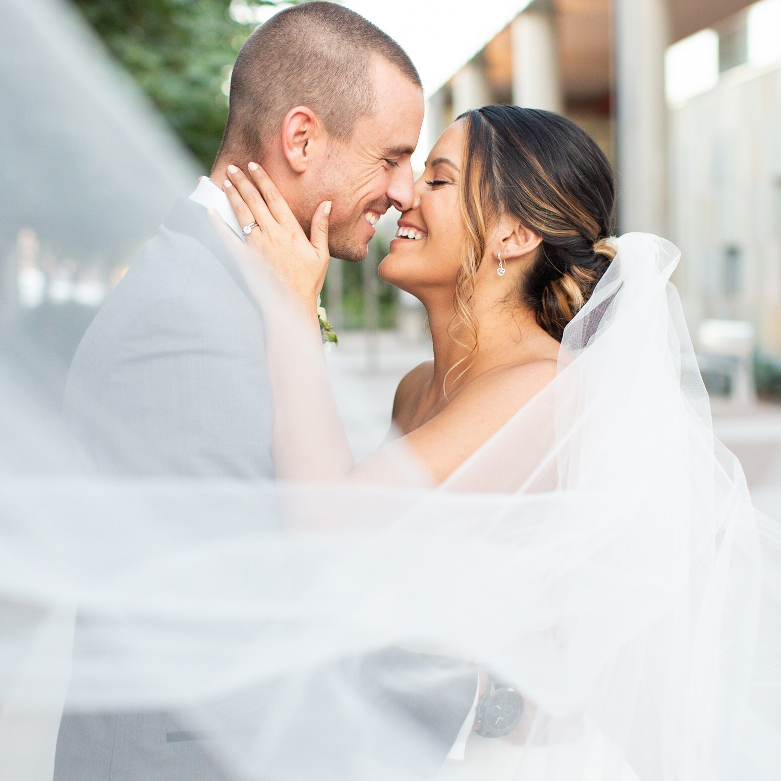 bride and groom veil