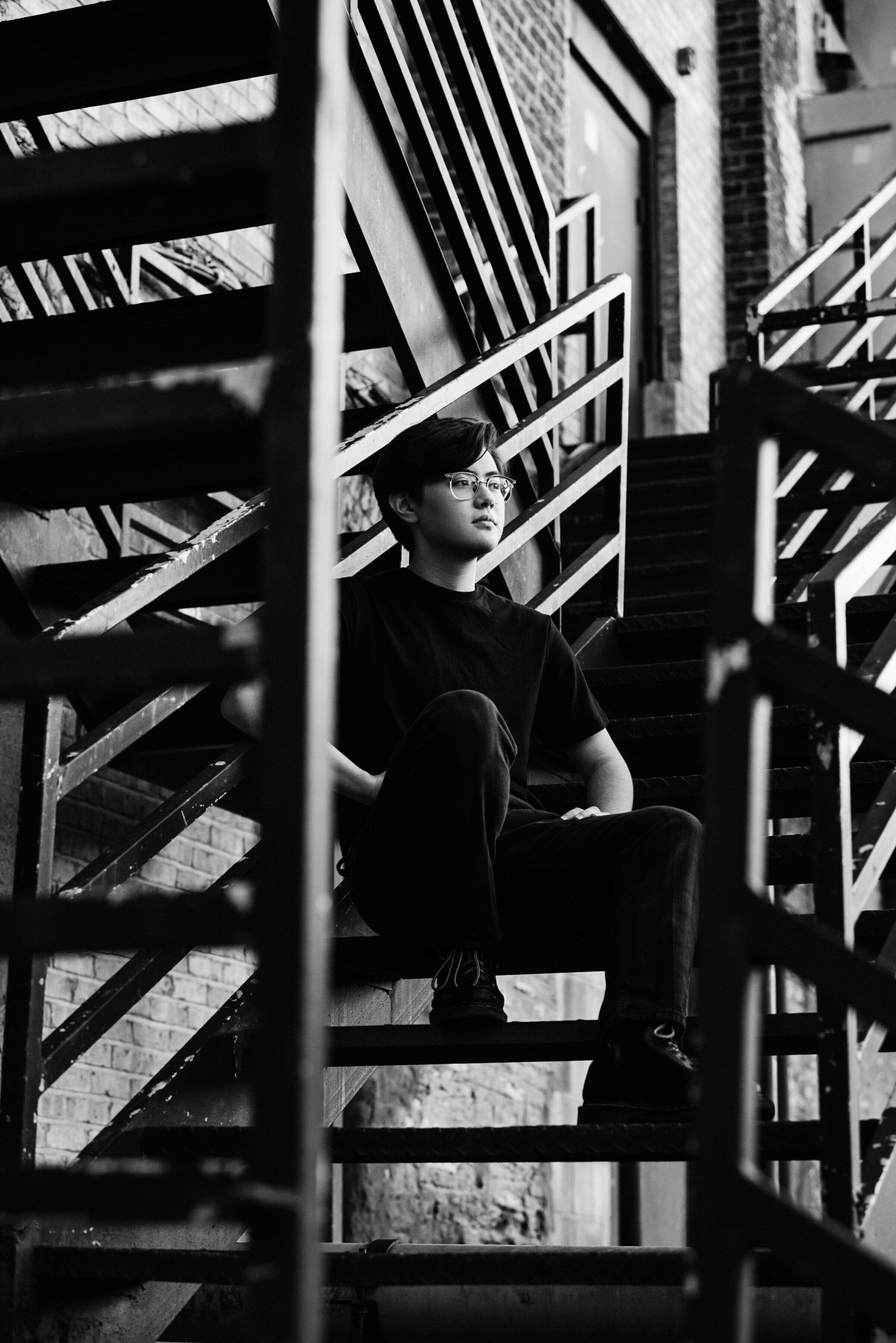 Mounds Minnesota high school senior photo of boy on stairwell in black and white
