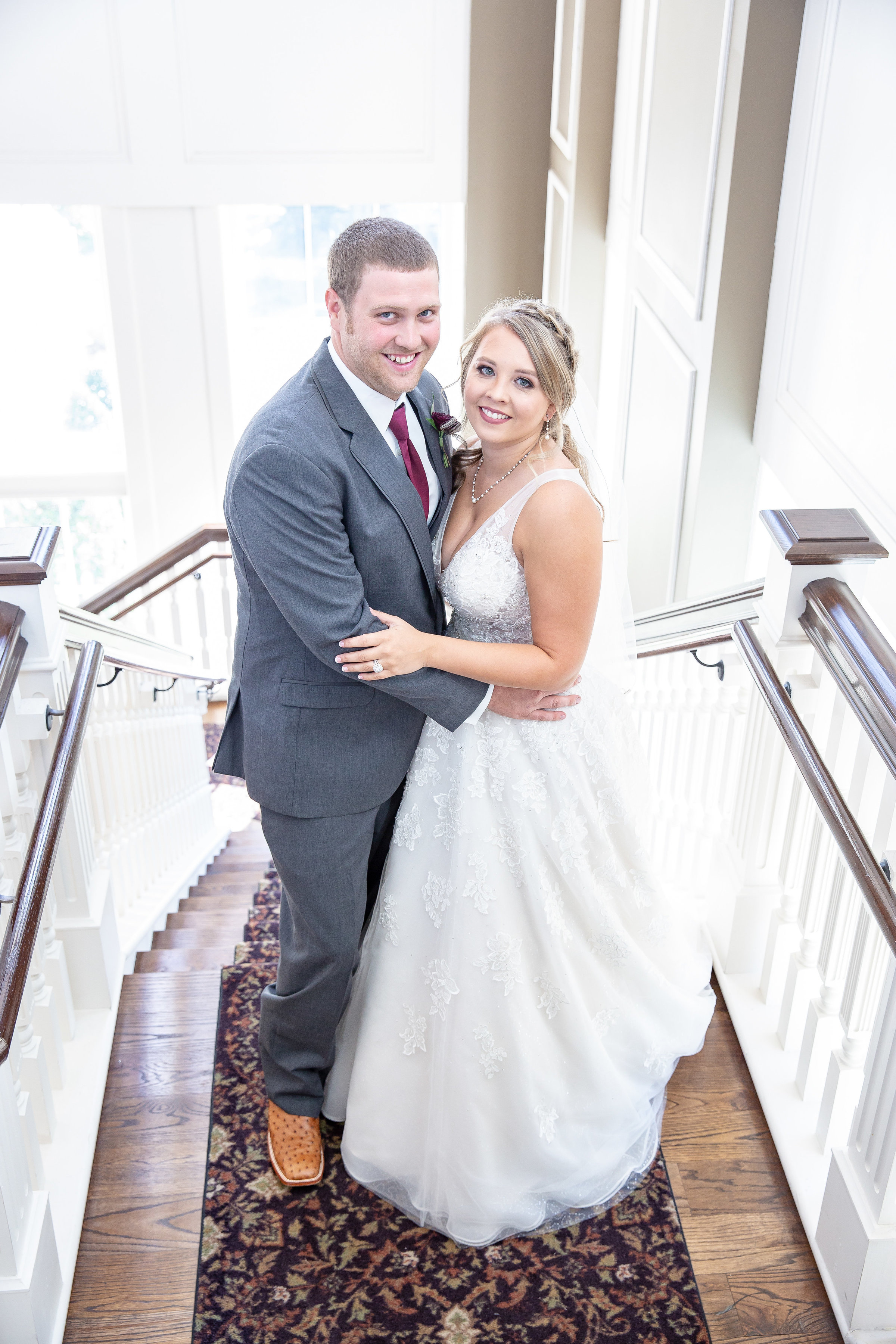 Bride and Groom on stairs at the Biloxi Visitors Center