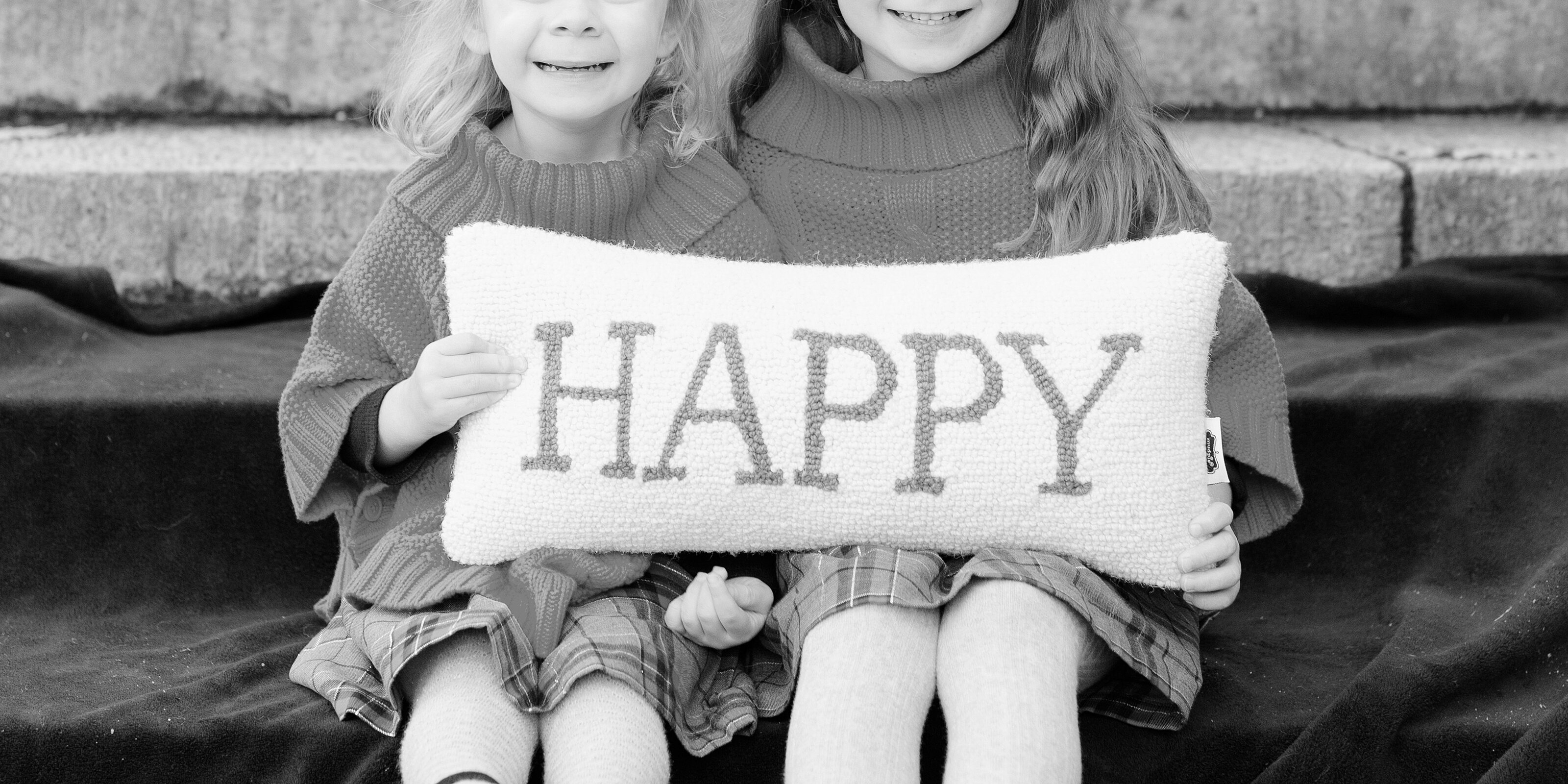 11_sisters-hold-happy-sign-pillow