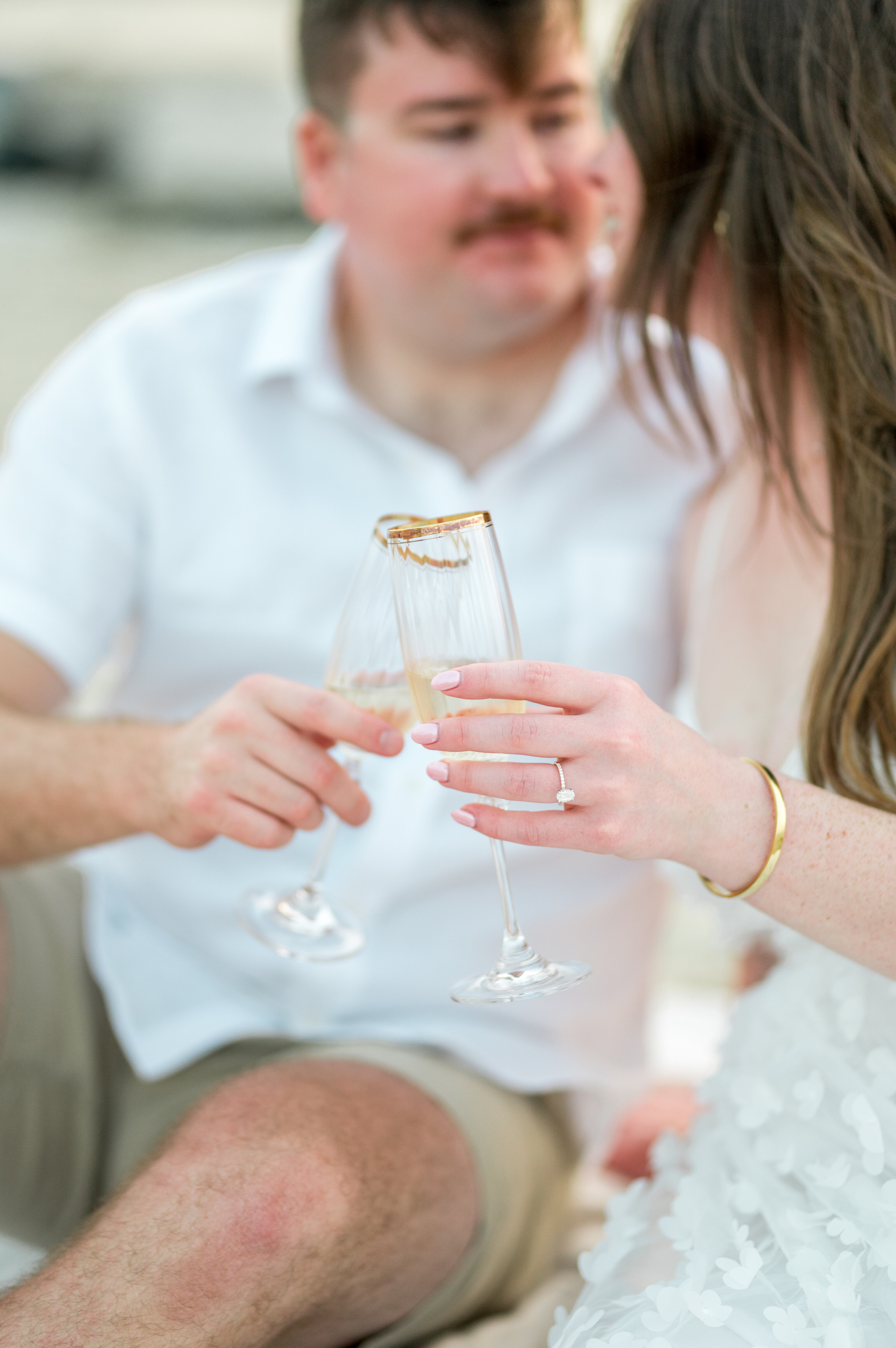 Engagement Ring and Champagne Cheers Photograph