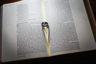 Wedding rings in Bible with Heart shadows at Mississippi Wedding