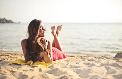 girl sitting on beach