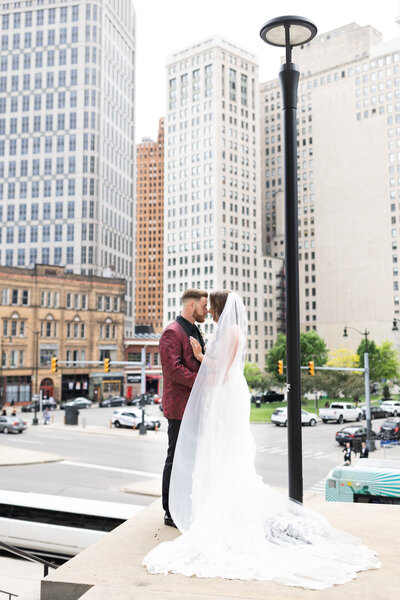 Bride and Groom kissing in downtown Detroit