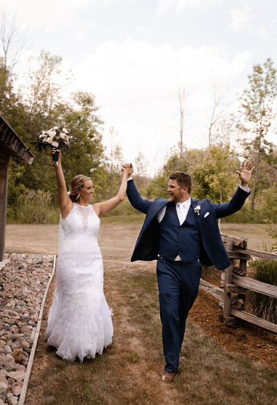 Bride and groom celebrate after eloping in colorado