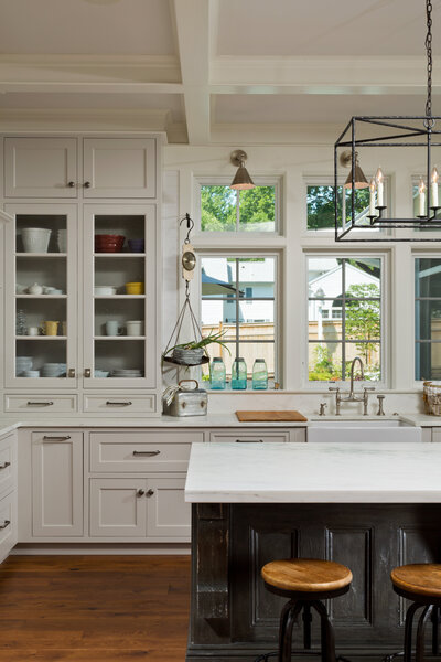 Light white kitchen with dark acccents