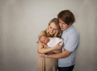 A small family at their Utah county newborn session.