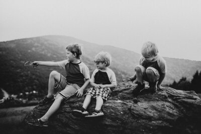 black and white photo of three children