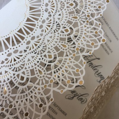 Creative Box created a Garden wedding invite for a wedding in Dubai. Invitations have gold foiling and embossing.