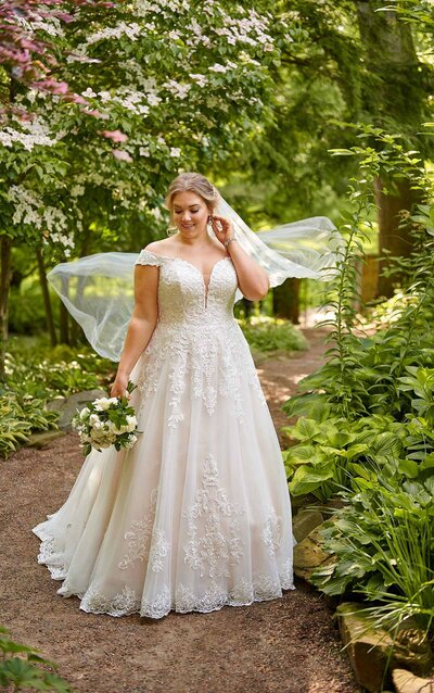 Adara is breathtaking in so many ways, from her amazingly airy skirt to the floral detail work.