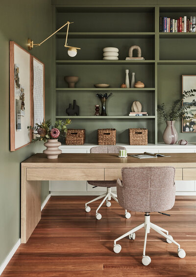 Melbourne home office styled by interior designer with custom shelving and timber desk.