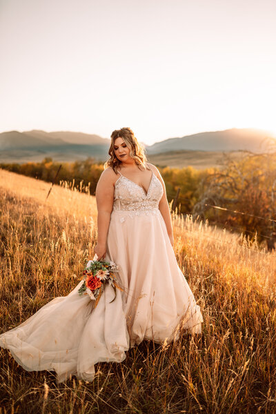 bride standing in the mountains of red lodge montana