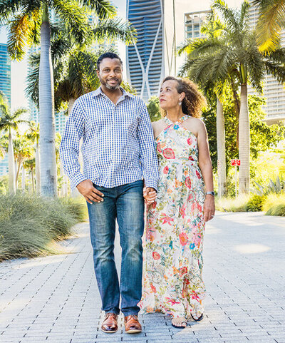 Miami wedding photographer Antonio and his wife Paula stroll through Musem Park Downtown Miami