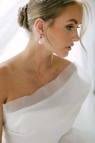 Expert bridal makeup artist creates flawless, natural beauty for brides.