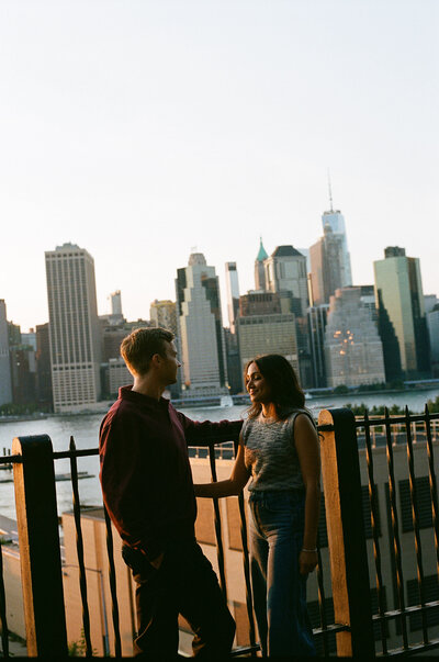 couple photos engagement photos couple hugging looking at camera studio shoot in brooklyn wedding photographer