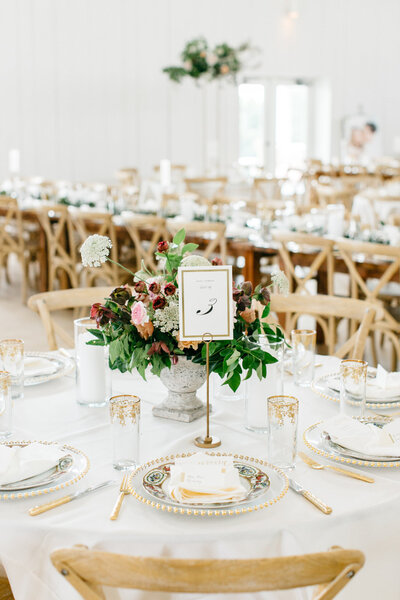 Luxury wedding table setting with gold and ornate elements