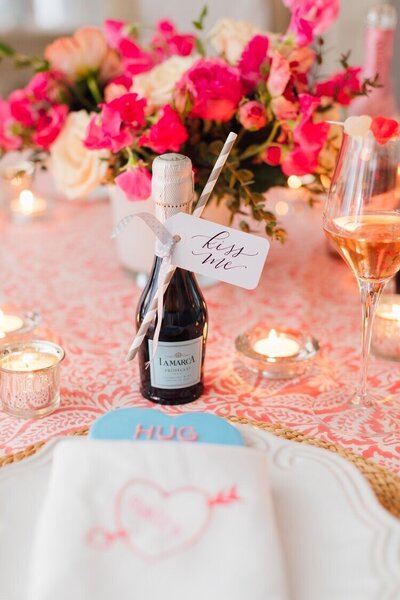 Mini prosecco bottle favors with calligraphy favor tag forValentine's Day