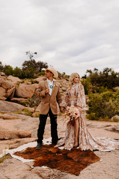 couple posing in desert