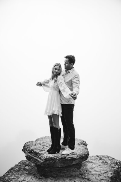 Couple standing on the edge of a cliff - North Shore, Minnesota