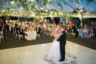 Greenery ceiling wedding with couple dancing