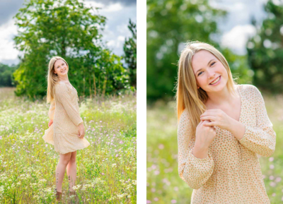 high school senior girl posting in a wildflower field wearing a cream floral dress