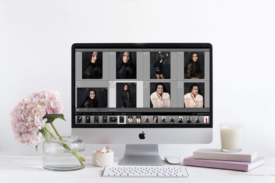 Feminine desk with iMac and photoshoot on screen