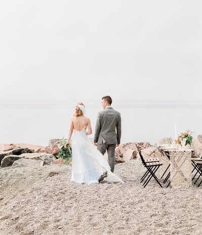 bride-and-groom-walk-the-beach