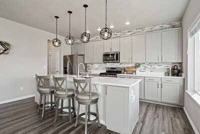 Staged primary bedroom in Northern Colorado home listed by Haug & Co.