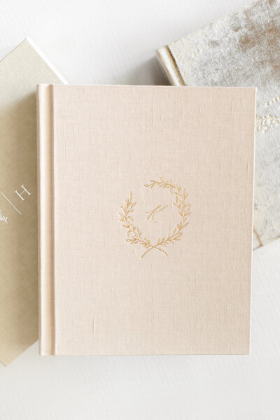 A  photo of a beautiful pink heirloom album by dc family photographer