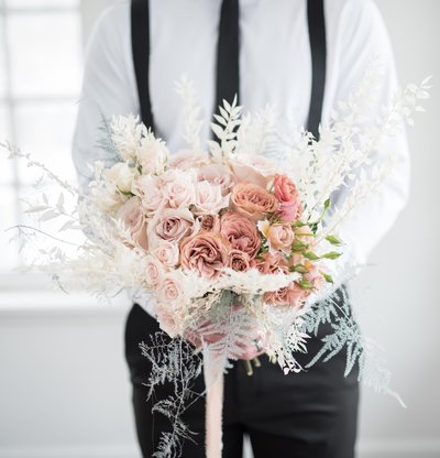 groom-with-flowers